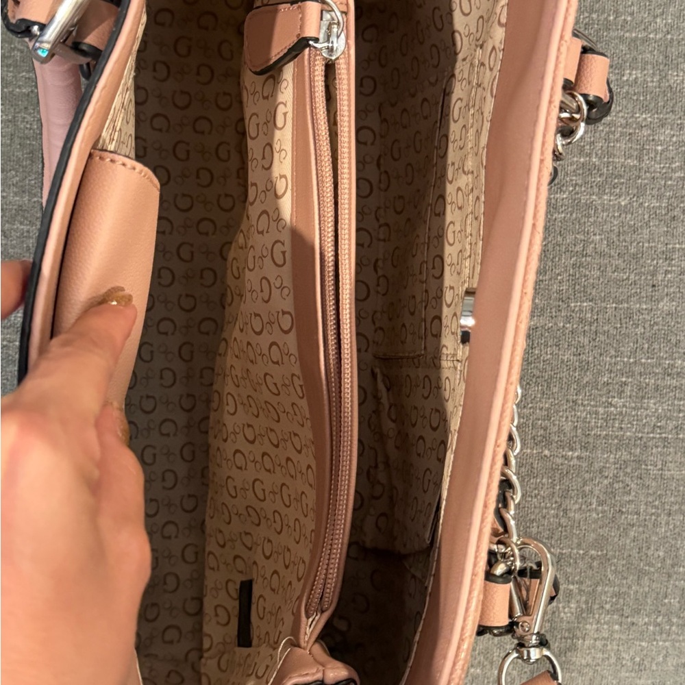 Pink Shoulder Bag with Multiple Compartments and Zipper Closures